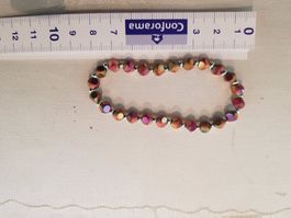Schönes rosa/gold Armband von moshi 8.5cm breit. Neu!