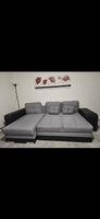 Divano letto grigio 