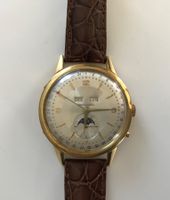 Montre Movado triple date phase de lune en OR 1950