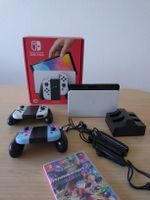 Nintendo Switch OLED white + Mario Kart 8 Deluxe + extras