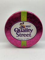 Boîte Quality Street vintage en métal rose