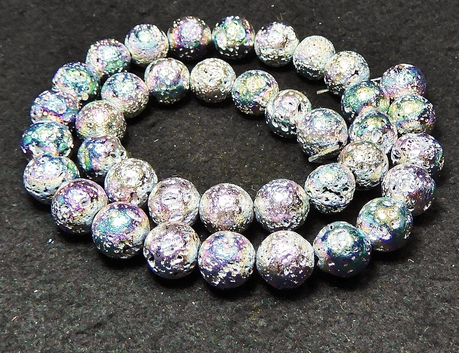 Catenine: 1 Strang Titanium silbern bedampfte echte Lava Perlen 10 mm – Nuovo (secondo la descrizione) da Müllheim Dorf venduto da GUENI01