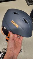 Kinderskihelm UVEX grau/orange mit Kinderskibrille