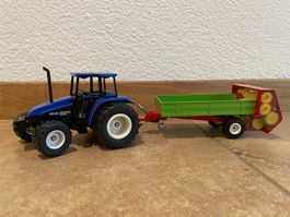 SIKU New Holland Ford 5635 mit Miststreuer