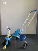 Tricycle pour enfant avec canne pour pousser Smoby