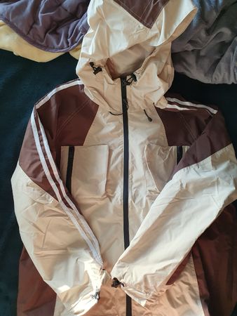 Veste impermeable beige et marron. Taille M-L neuf