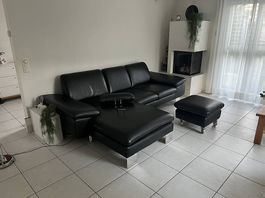 Leder-Sofa mit Longchair und Hocker