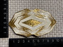 Gürtelschnalle gold farbig