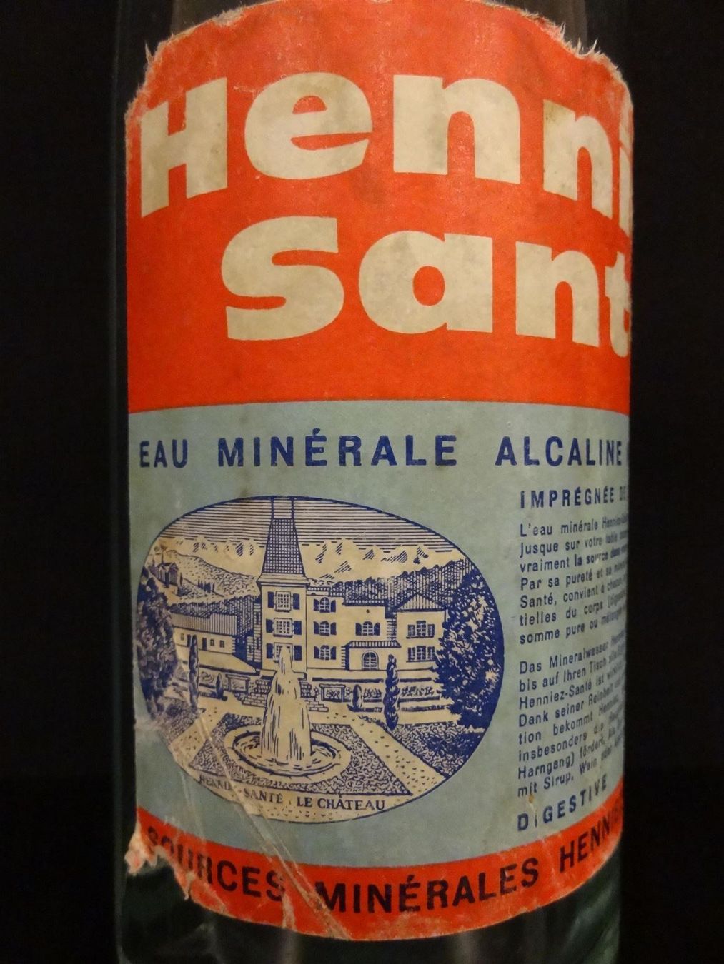Bicchieri, Caraffe & Bottiglie: alte Flasche HENNIEZ SANTÉ – Usato da Kerzers venduto da Flaschenposten 2