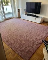 Tapis rose mélangé