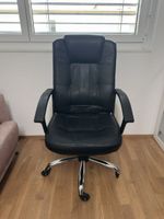 Bürostuhl Leder schwarz gebraucht mit Gummirollen