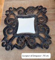 Miroir artisanal en métal ajouré