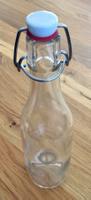 Glasflasche mit Bügel