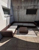 Garten-Lounge aus Polyrattan mit Loungetisch