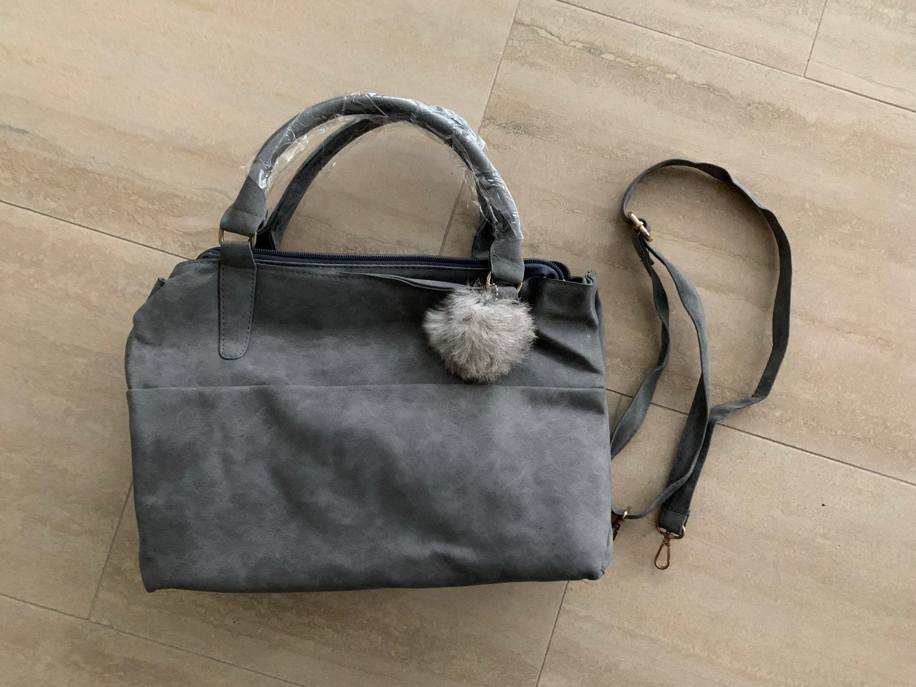 Borse da donna: Graue Tasche (unbenutzt) – Nuovo e nell'imballaggio originale da Zürich venduto da LANAtEs