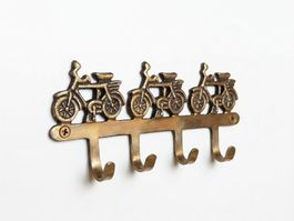 Porte-manteau mural vintage en bronze avec vélos! Chic