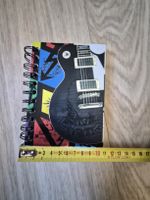 Carnet à spirales motif guitare papier quadrillé