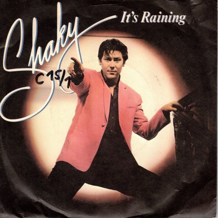 Dischi in vinile: Shakin Stevens  -- It`s  Raining  Single7 – Usato da Oberwil (Dägerlen) venduto da thespecials