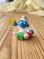 Schlumpf Baby mit Spielklötzen