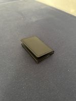 schwarzer Mini-Geldbeutel , neuwertig