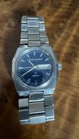 Daron Quartz montre vintage acier inoxydable,bon état!
