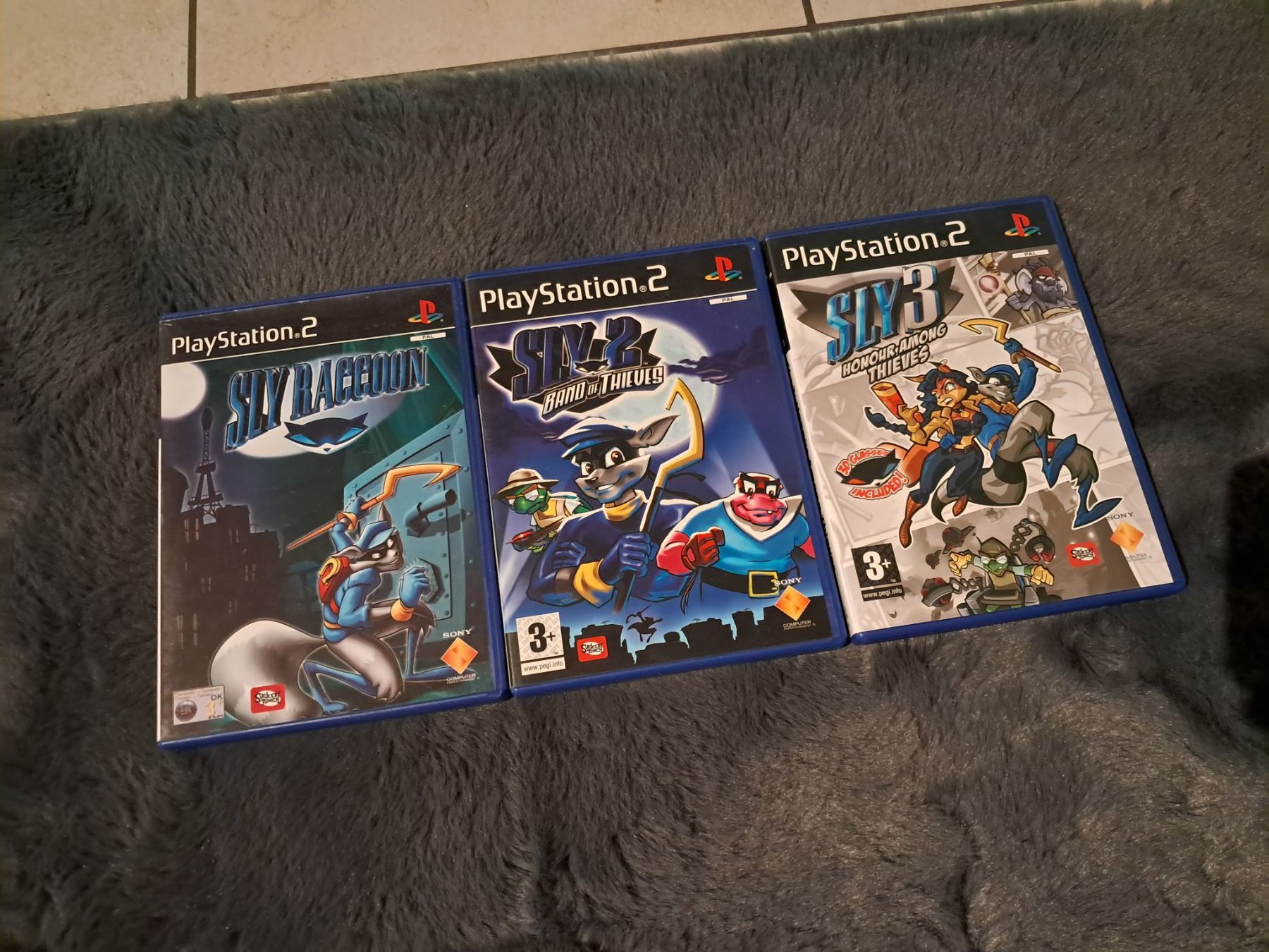 Spiele: PS2,   SLY 1,2 3.  JAK 1,2,3.   DEVIL MAY CRY 1,2,3 – Gebraucht aus Itingen von AnTiNoRmAl 1