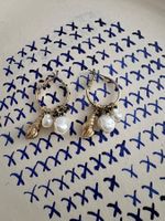 Hoop earrings with pearl and shell design