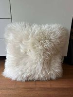 Large white sheepskin fur pillow