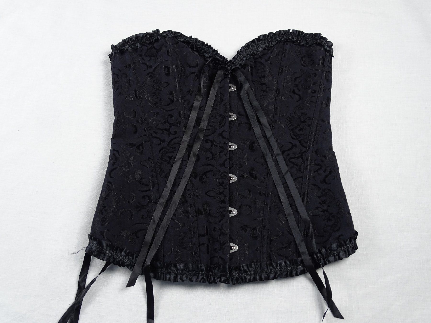 Altra biancheria intima: Schwarzes Korsett mit Muster – Usato da Solothurn venduto da hli_n69n