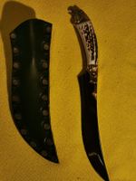 Jagdmesser mit Adlerkopf und Grief aus Hirschgeweih