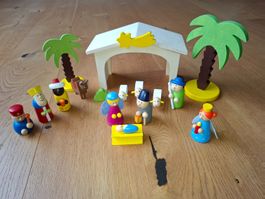 Weihnachtskrippe aus Holz mit Spielfiguren