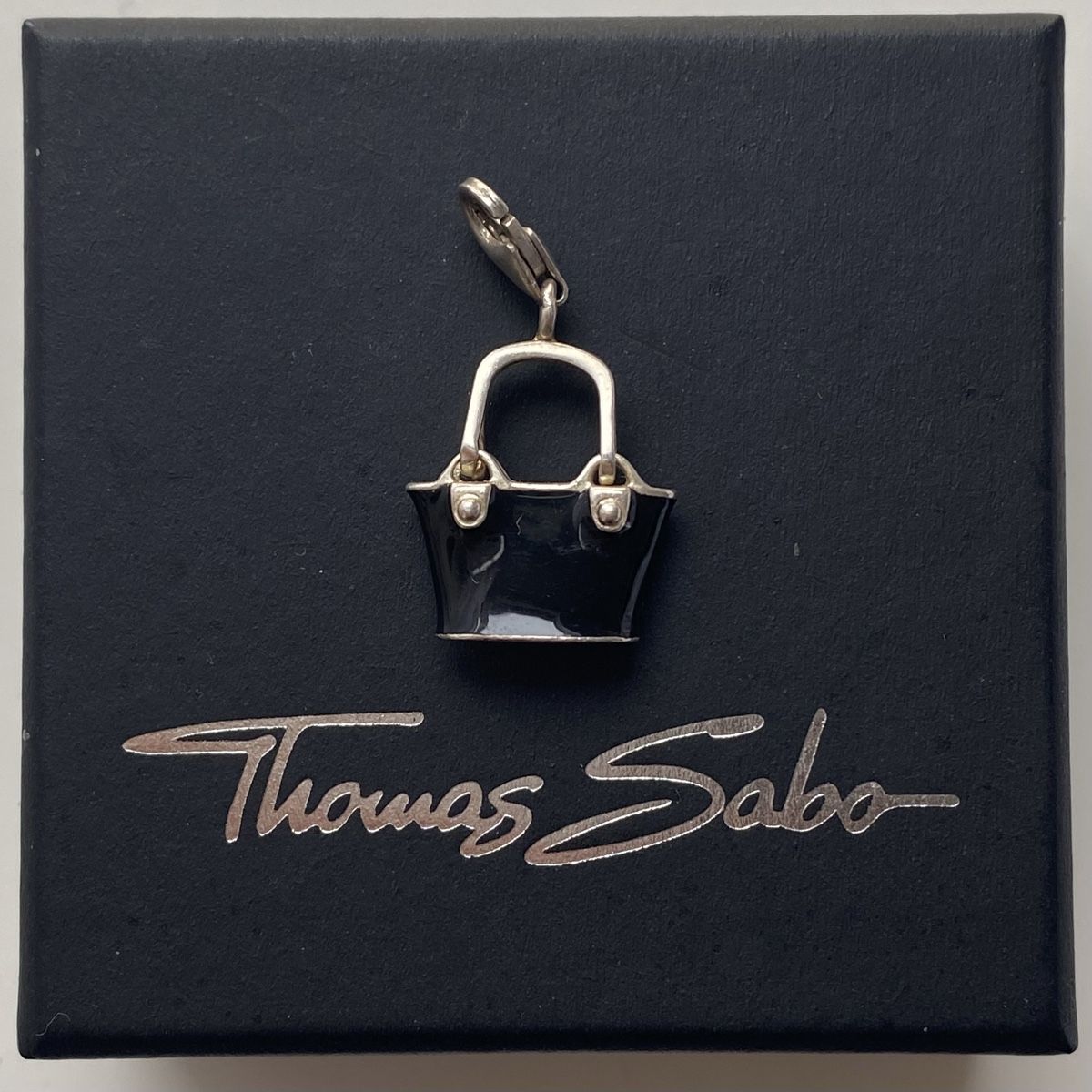 Thomas Sabo Ciondoli: Thomas Sabo Silber 925 Schwarze Handtasche Charms – Usato da Givisiez venduto da dor_xb9k