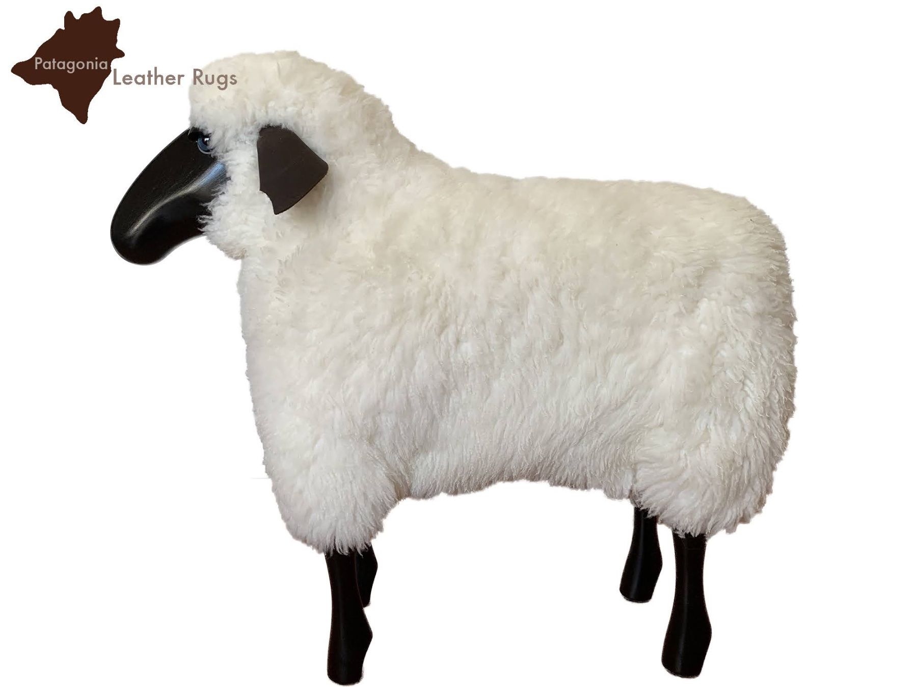 Hocker: Schaf klein White fur - Black wood – Neu und originalverpackt aus Arbedo von patagonialeatherrugs