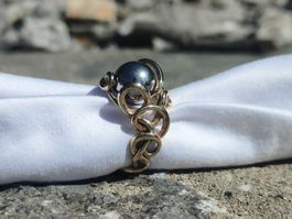 Bague Gilbert Albert en or jaune avec 4 billes