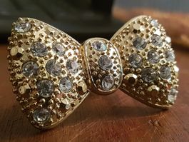 Ring Masche Lätsch Glitzer goldfarben/weiss riesig, auffall.