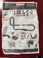 Carrera GO Swiss City Action Autorennbahn Set mit Autos