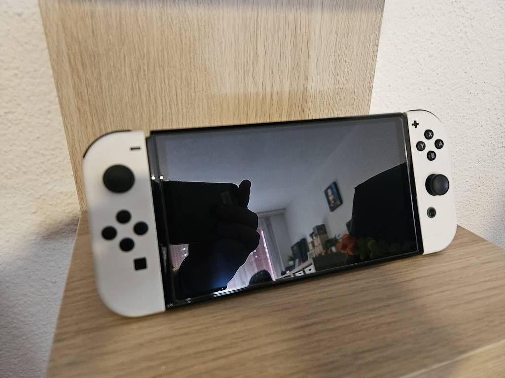 Konsolen: Nintendo Switch OLED – Gebraucht aus Steinen von Manjix 1