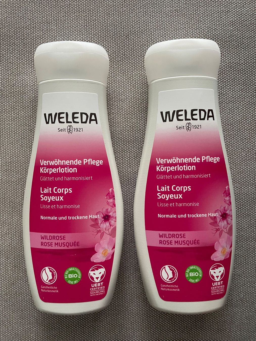 Weleda Idratazione: 2 Weleda Bodylotion Wildrose + 1 angefangene Sonnencreme 50+ – Nuovo (secondo la descrizione) da Uster venduto da em_58td