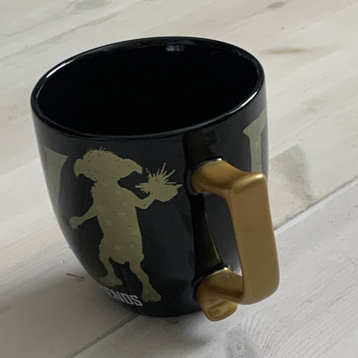 Tazze: Harry Potter Tasse /Dobby / mit Gold Henkel – Usato da Hinteregg venduto da GARANTA 5