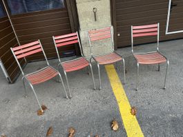 Lot de 4 chaises Bigla vintage en plastique et métal rouge,