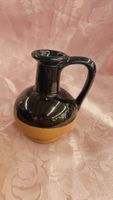 Piccola anfora in ceramica marrone bicolore