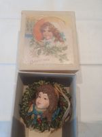 Nostalgischer Christbaumschmuck, Mädchenkopf im Kranz