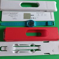 Swatch S028G108, montre turquoise avec emballage d'origine.