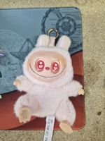 Peluche rose avec porte-clés bon état