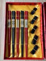 Essstäbchen Set rot/schwarz mit Auflagen neu