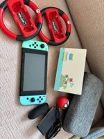 Nintendo Switch + accessoires + 4 jeux