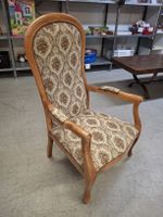 Antiker Sessel mit Blumenmuster