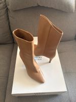Bottines en cuir beige Bon Génie, p.37
