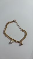Elegante goldfarbene Armkette mit Perle - Neuwertig!