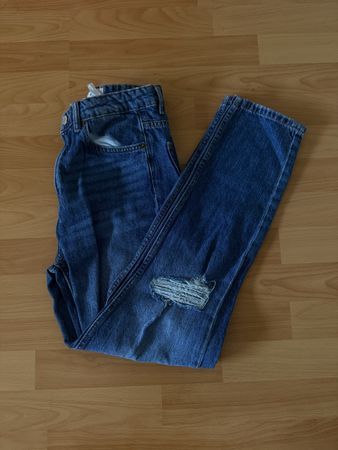 Jean bleu déchiré taille 36 bon état